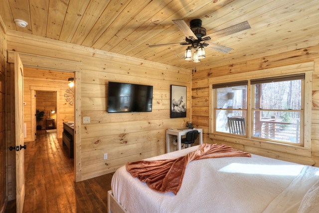 956 Lemmon Lane Ellijay, GA 30540 - Photo 25 of 60 a bedroom with a bed and a flat screen tv