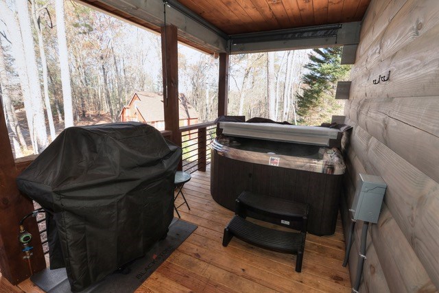 956 Lemmon Lane Ellijay, GA 30540 - Photo 41 of 60 a living room with furniture and a piano next to a large window