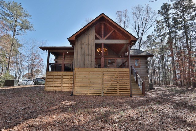 956 Lemmon Lane Ellijay, GA 30540 - Photo 42 of 60 a front view of a house with a yard