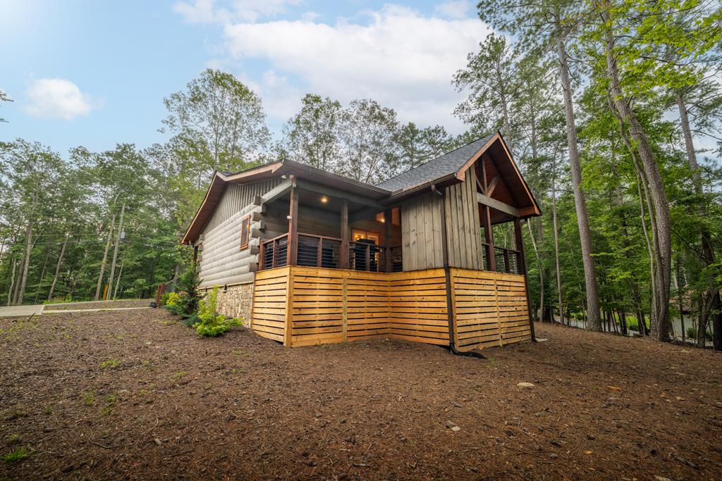 956 Lemmon Lane Ellijay, GA 30540 - Photo 60 of 60 a view of a house with a yard and large tree