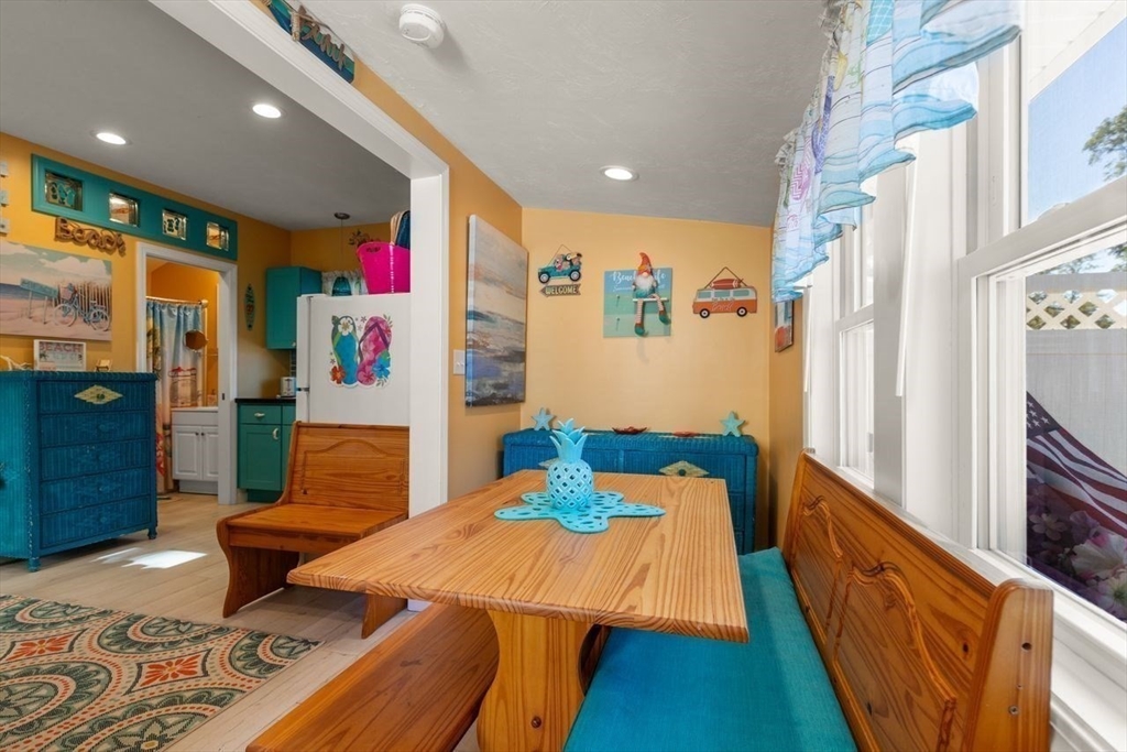 66 Bayview Street Wareham, MA 02571 - Photo 18 of 37 a bed room with a bed and glass door