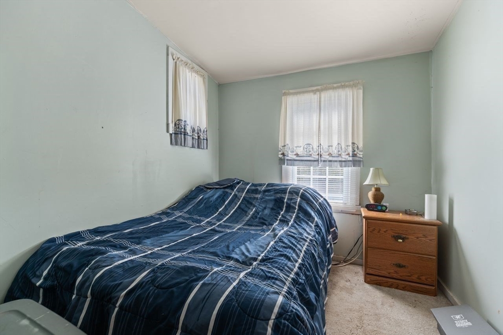 66 Bayview Street Wareham, MA 02571 - Photo 31 of 37 a bedroom with a bed and window