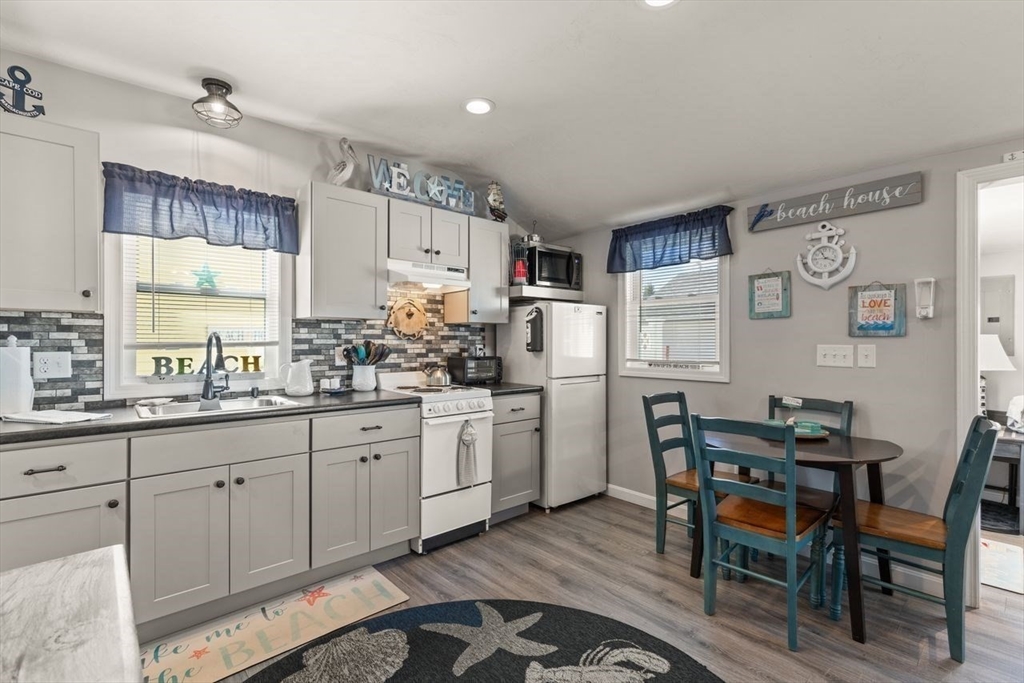 66 Bayview Street Wareham, MA 02571 - Photo 6 of 37 a kitchen with sink and cabinets