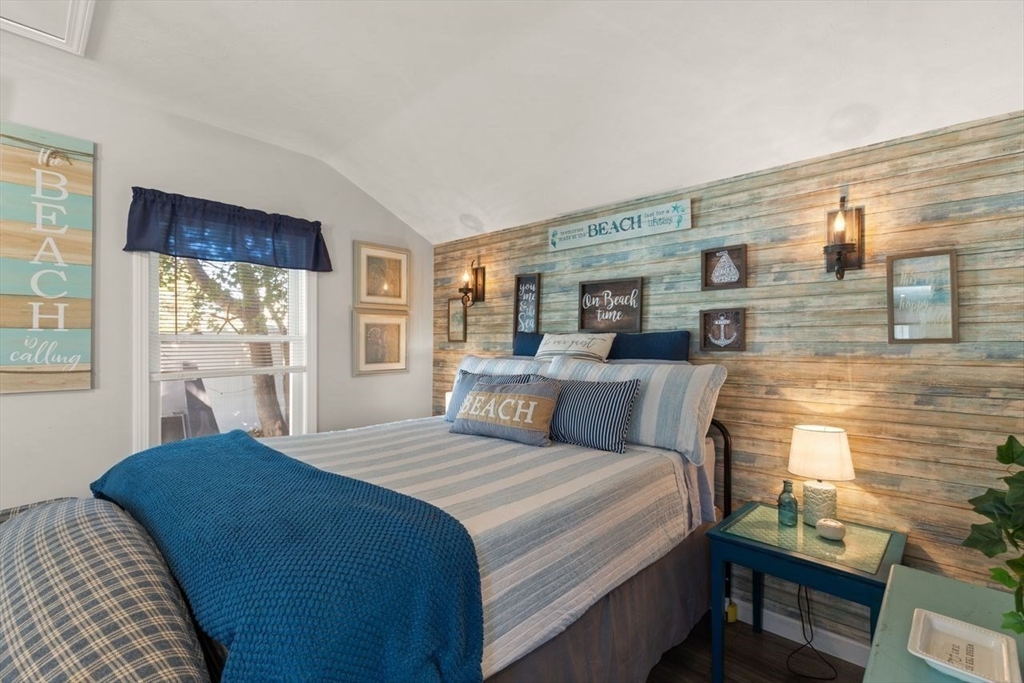 66 Bayview Street Wareham, MA 02571 - Photo 9 of 37 a bedroom with a bed and a night stand