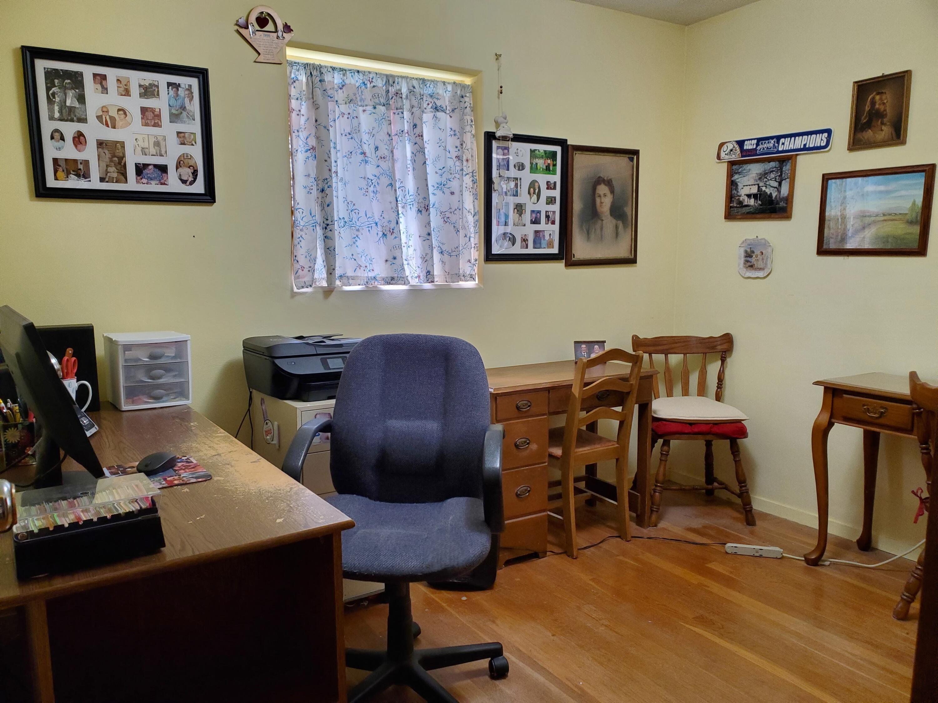 805 West Washington Street Rensselaer, IN 47978 - Photo 11 of 15 a view of a workspace with furniture and wooden floor