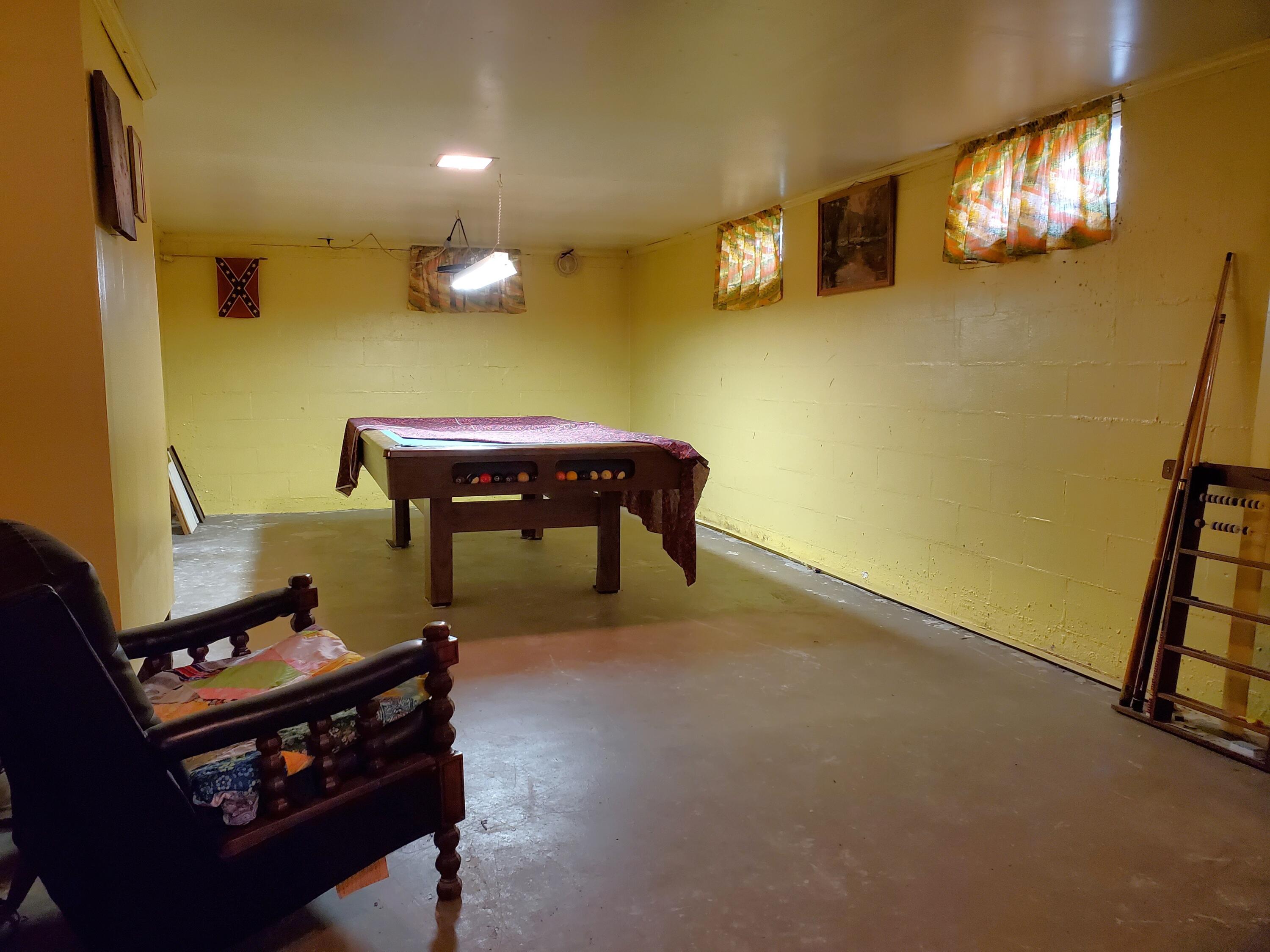 805 West Washington Street Rensselaer, IN 47978 - Photo 13 of 15 a room with furniture and a flat screen tv