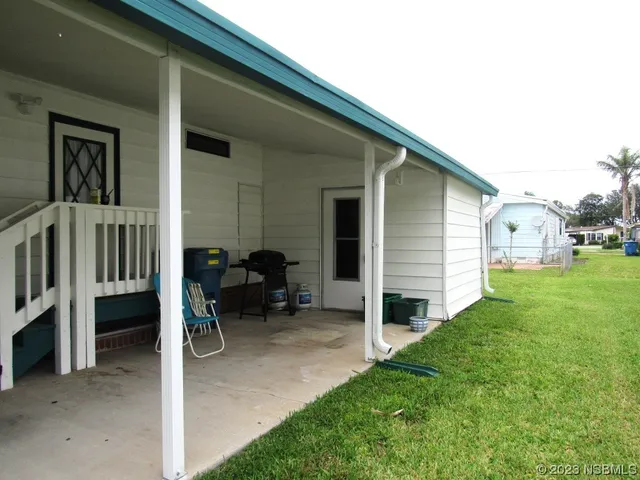 a view front of house with patio
