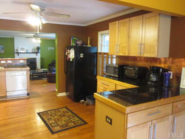 207 Plainview Avenue Raleigh, NC 27604 - Photo 24 of 25 Very nice open floor plan! LOTS of cabinet space and counter top space! here is plenty of room for a much larger refrigerator if you would like, but seller is leaving this one also if you would like! Smooth ceilings throughout!