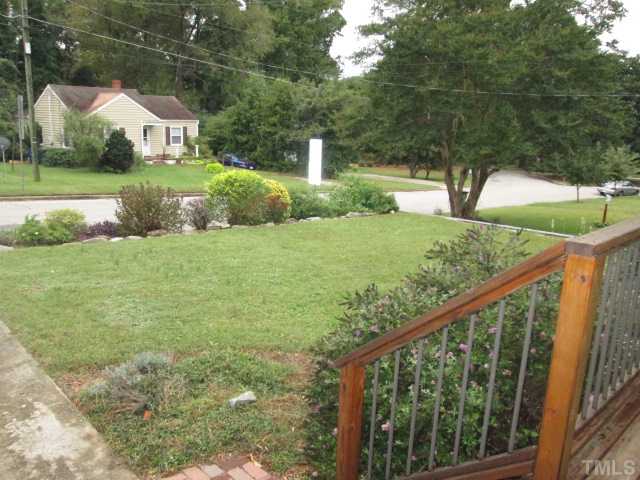 207 Plainview Avenue Raleigh, NC 27604 - Photo 6 of 25 Good shot of the front yard and surroundings as well as the updated porch pickets and pressure treated decking/porch itself! This home is only minutes to downtown Raleigh and walking distance to parks and more!