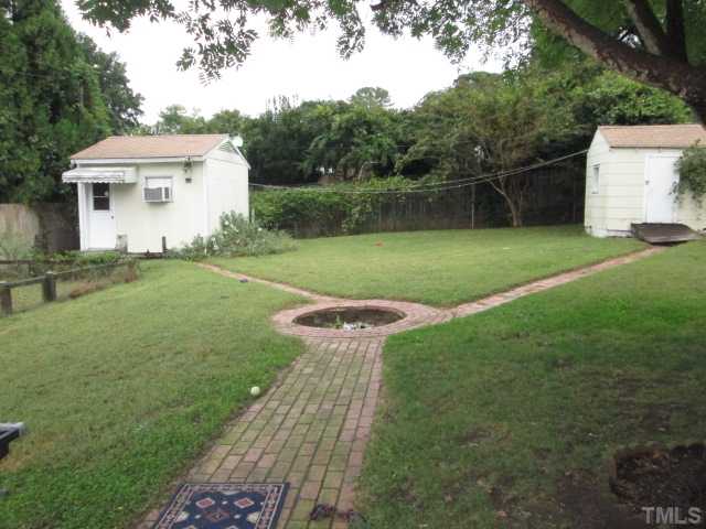 207 Plainview Avenue Raleigh, NC 27604 - Photo 7 of 25 Nice size backyard and 3 sheds, two large enough to be work shops and are wired! Backyard is pretty private and these old custom walk ways have been down for years! Fire Pit in the middle of fill in for planting! Fenced Garden area also!