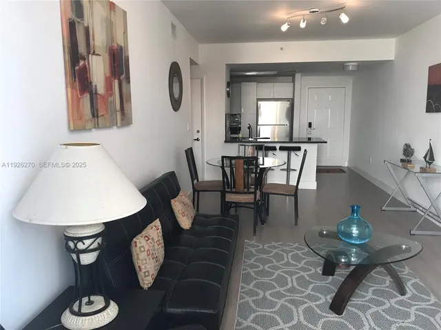 a view of a dining room with furniture