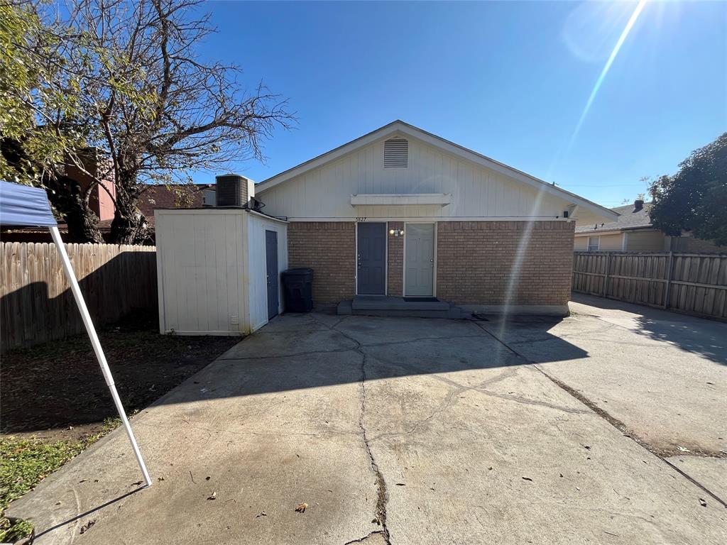 5827 Columbia Avenue Dallas, TX 75214 - Photo 14 of 15 a view of a small space in front of a house with a garage