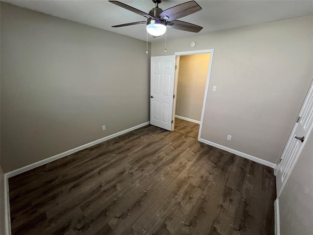 5827 Columbia Avenue Dallas, TX 75214 - Photo 7 of 15 wooden floor in an empty room