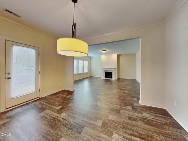 a kitchen with stainless steel appliances granite countertop a stove a sink dishwasher a refrigerator and a microwave