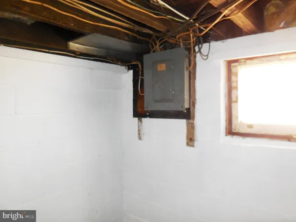 a view of walk in closet with window
