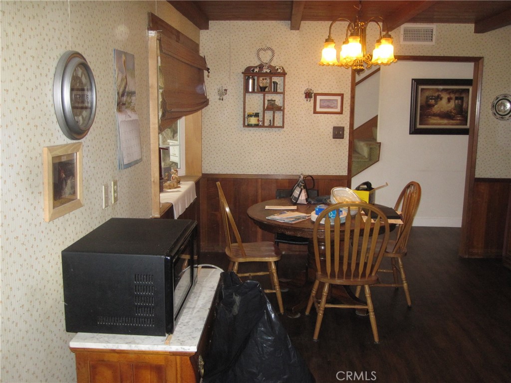 8532 Cedar Drive Buena Park, CA 90620 - Photo 20 of 40 a view of a dining room with furniture and chandelier