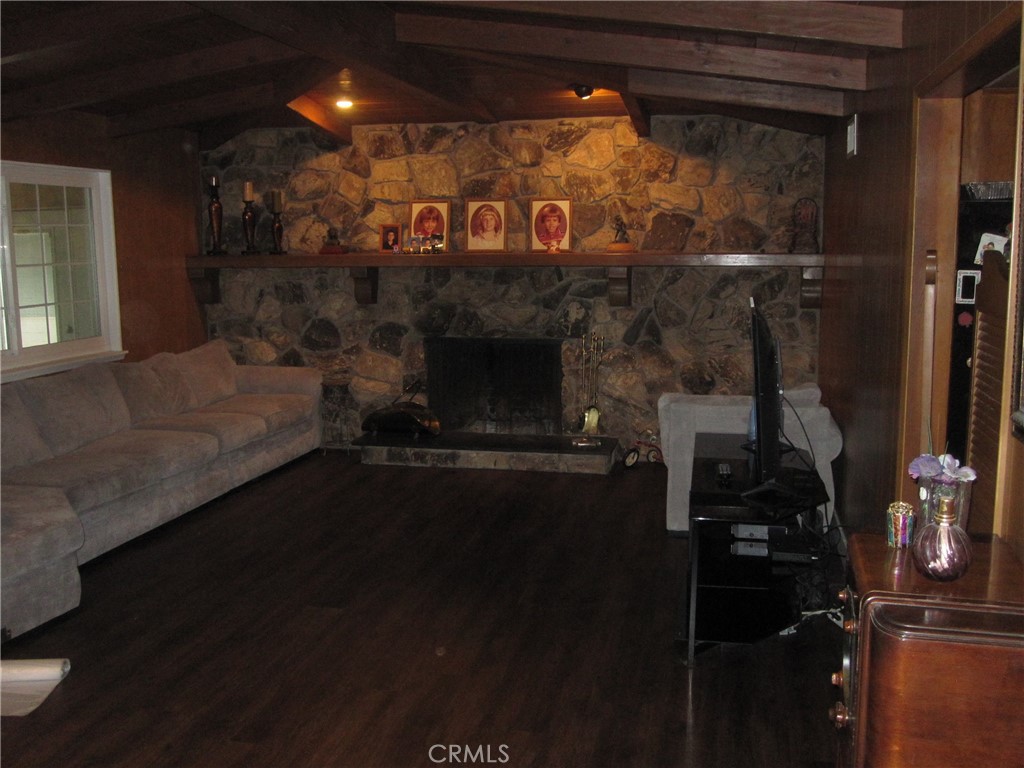 8532 Cedar Drive Buena Park, CA 90620 - Photo 22 of 40 a living room with furniture and a fireplace