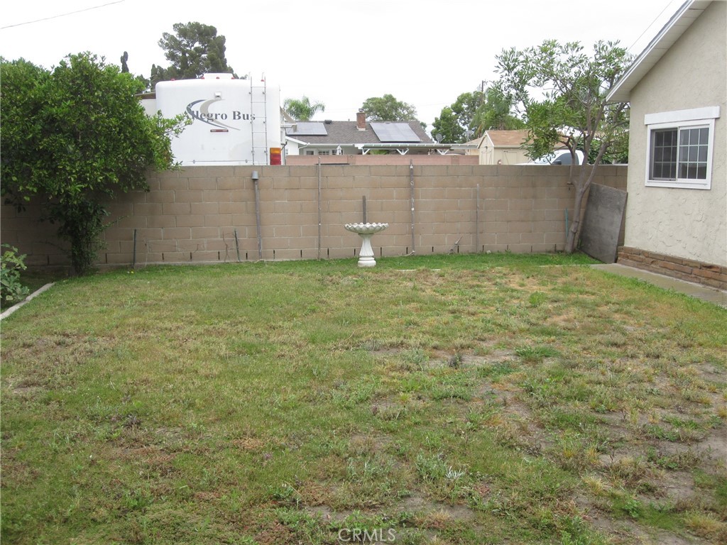 8532 Cedar Drive Buena Park, CA 90620 - Photo 32 of 40 a backyard of a house with lots of green space and fountain