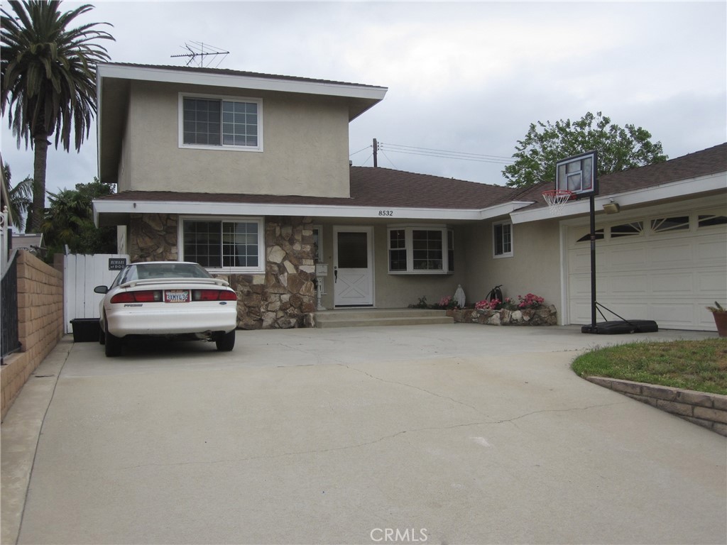 8532 Cedar Drive Buena Park, CA 90620 - Photo 37 of 40 a car parked in front of house