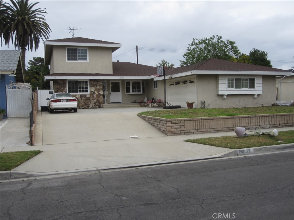 8532 Cedar Drive Buena Park, CA 90620 - Photo 38 of 40 a front view of a house with garden