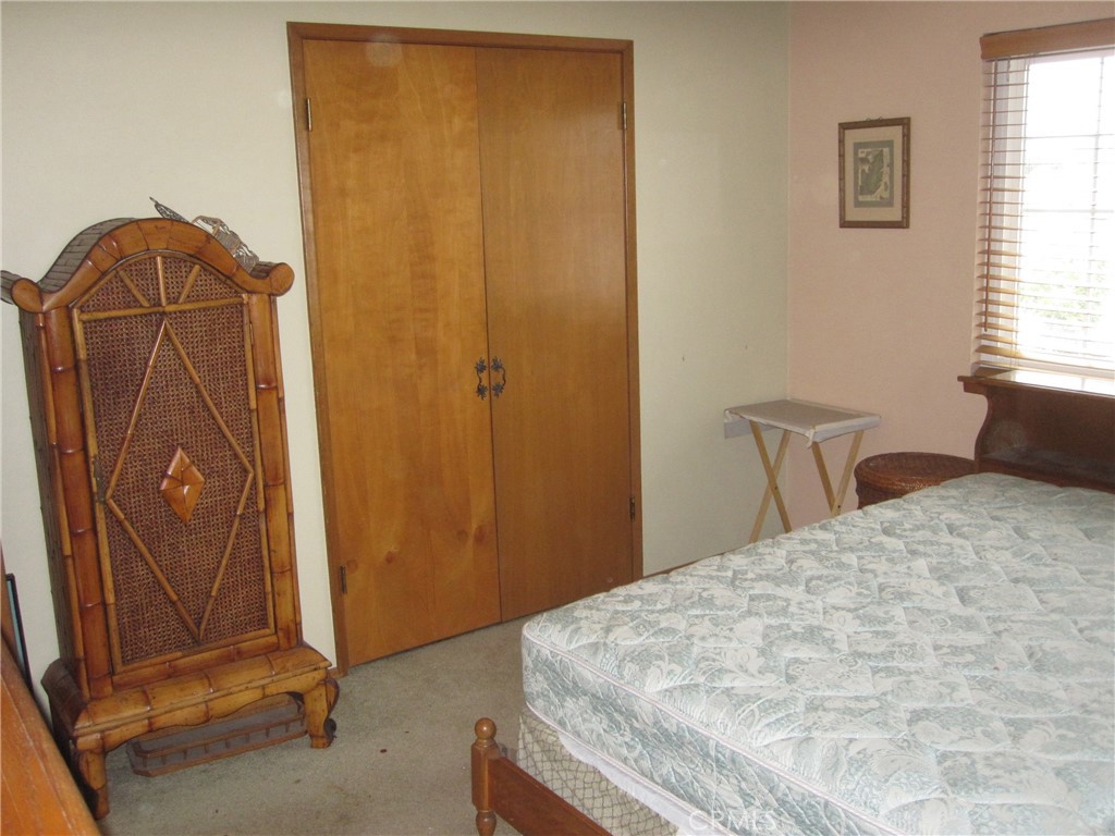 8532 Cedar Drive Buena Park, CA 90620 - Photo 9 of 40 a bedroom with a bed and a window