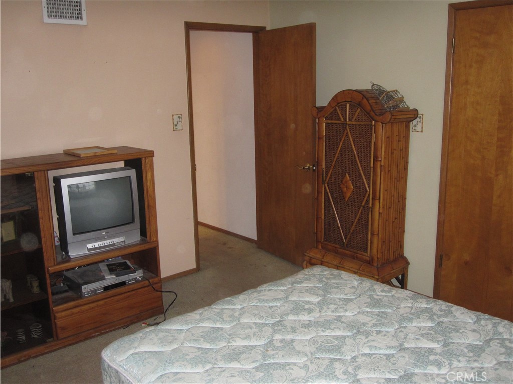 8532 Cedar Drive Buena Park, CA 90620 - Photo 10 of 40 a view of a livingroom with furniture and a flat screen tv