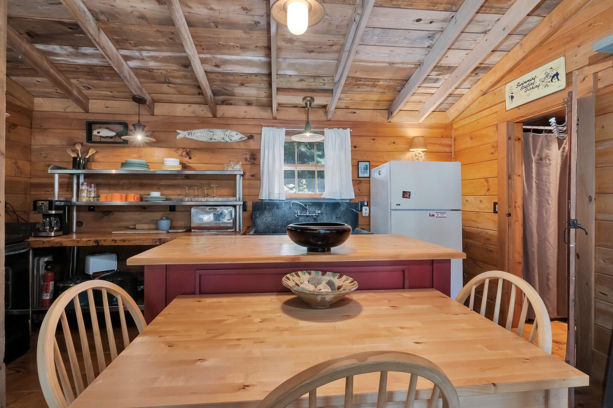 1975 State Highway, Unit 9 Eastham, MA 02642 - Photo 13 of 23 a view of a dining room with furniture window and outside view