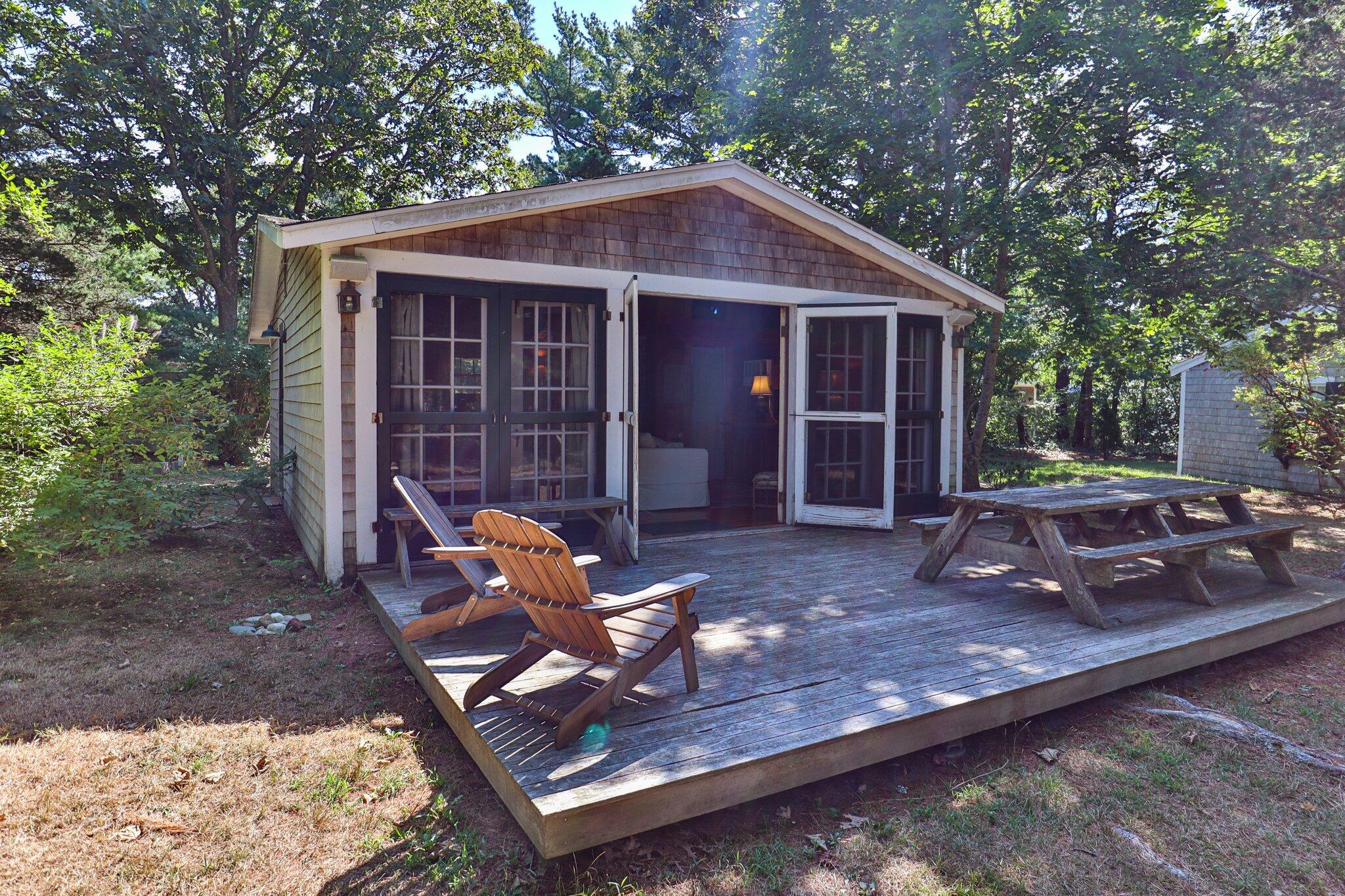 1975 State Highway, Unit 9 Eastham, MA 02642 - Photo 17 of 23 a view of a house with backyard
