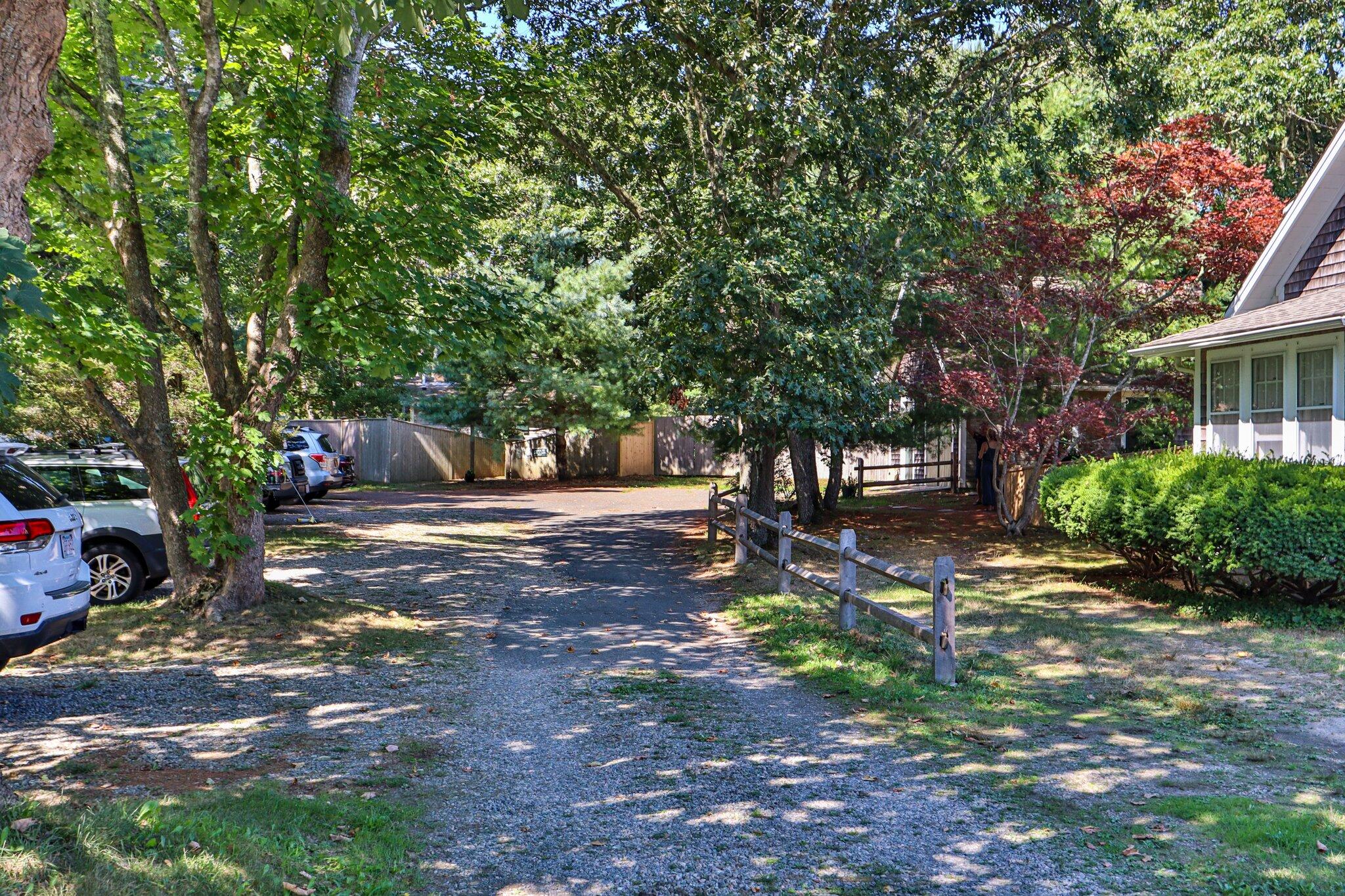 1975 State Highway, Unit 9 Eastham, MA 02642 - Photo 22 of 23 a view of a tree in front of a house