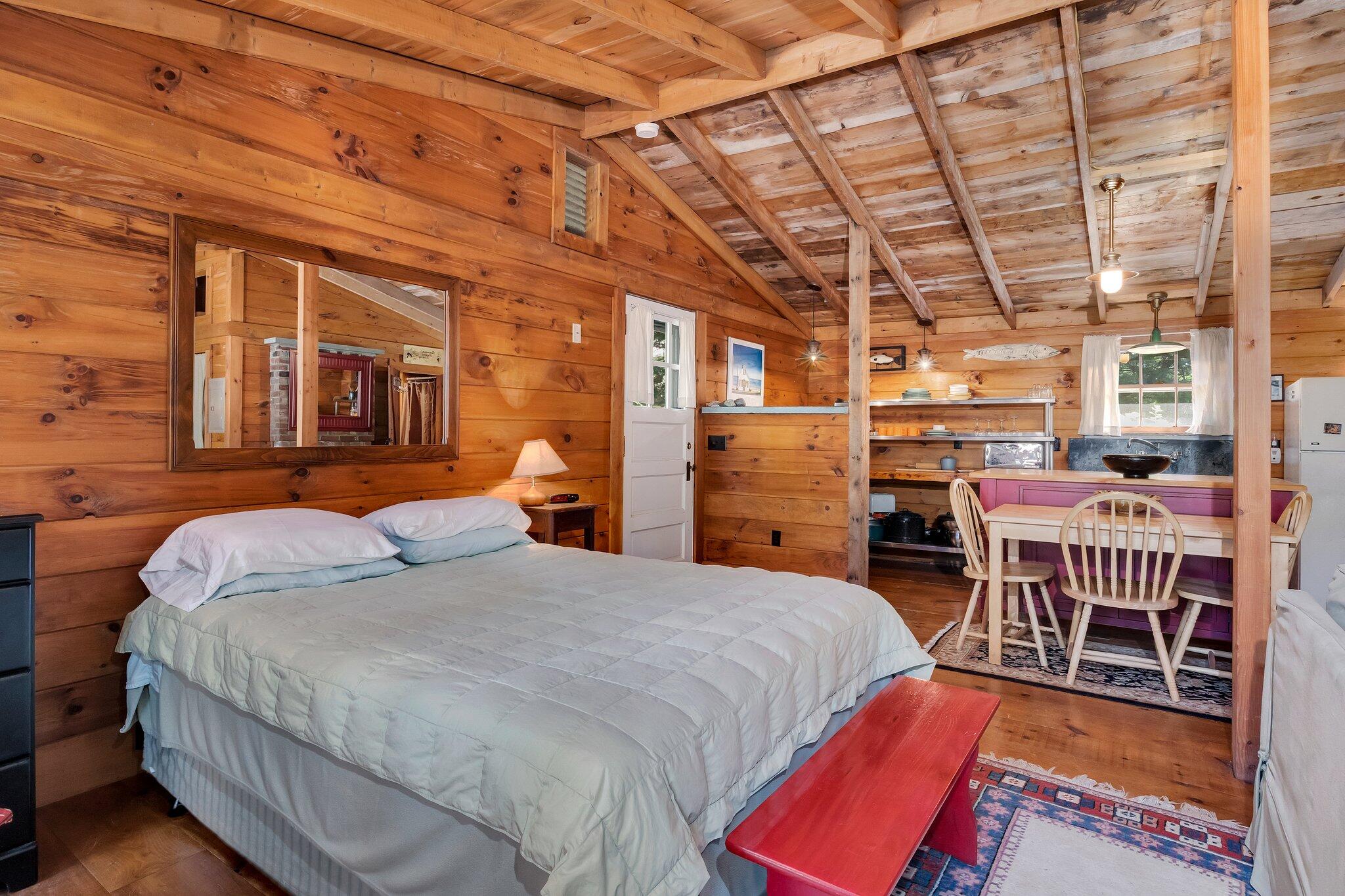 1975 State Highway, Unit 9 Eastham, MA 02642 - Photo 10 of 23 a bed room with a bed and a chair