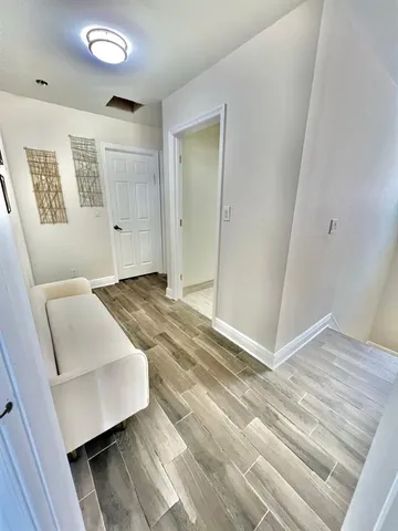 a view of livingroom with furniture and window