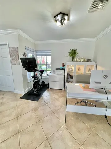 a living room with furniture and a couch
