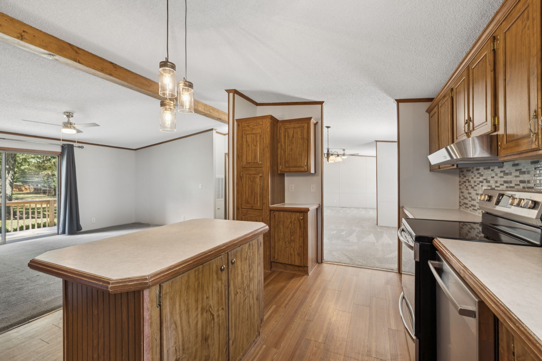 249 Ramsey Road Lebanon, TN 37087 - Photo 22 of 45 a kitchen with a stove a refrigerator and a fireplace