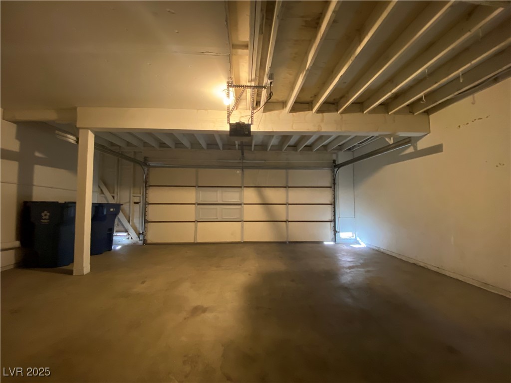 1722 East University Avenue, Unit 8 Las Vegas, NV 89119 - Photo 21 of 28 Garage with a garage door opener