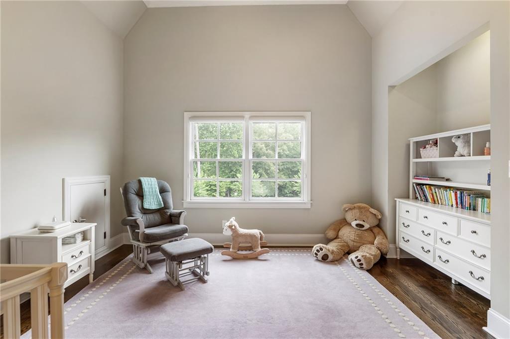 14560 Wood Road Milton, GA 30004 - Photo 43 of 74 a living room with furniture and a window