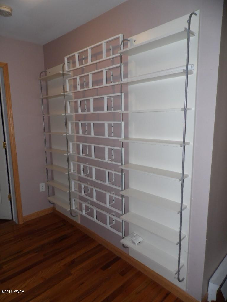 152 Gold Key Road Milford, PA 18337 - Photo 17 of 37 Custom shelving in Living room