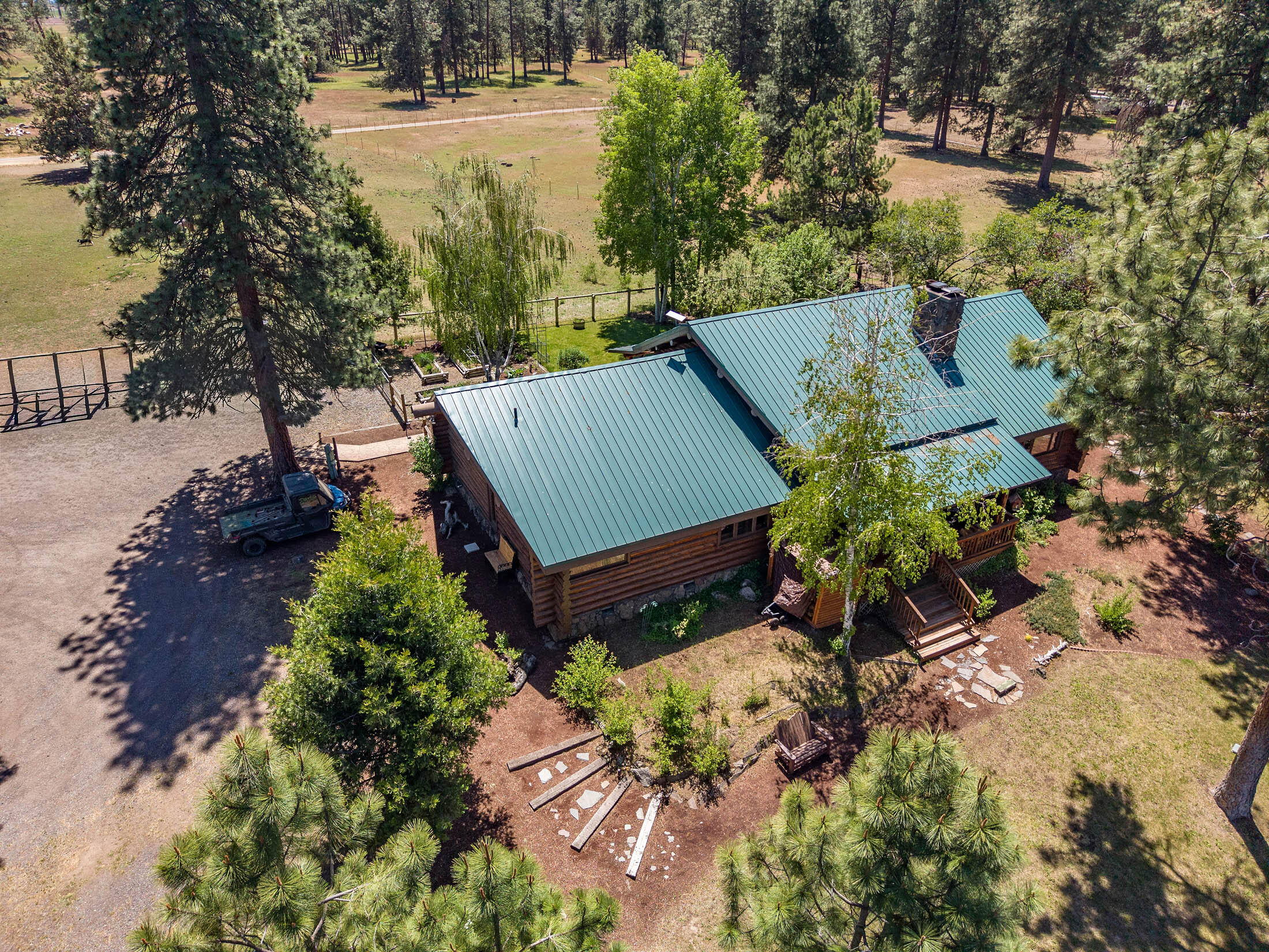 32907 River Bend Road Chiloquin, OR 97624 - Photo 64 of 83 an aerial view of a house with yard and outdoor seating