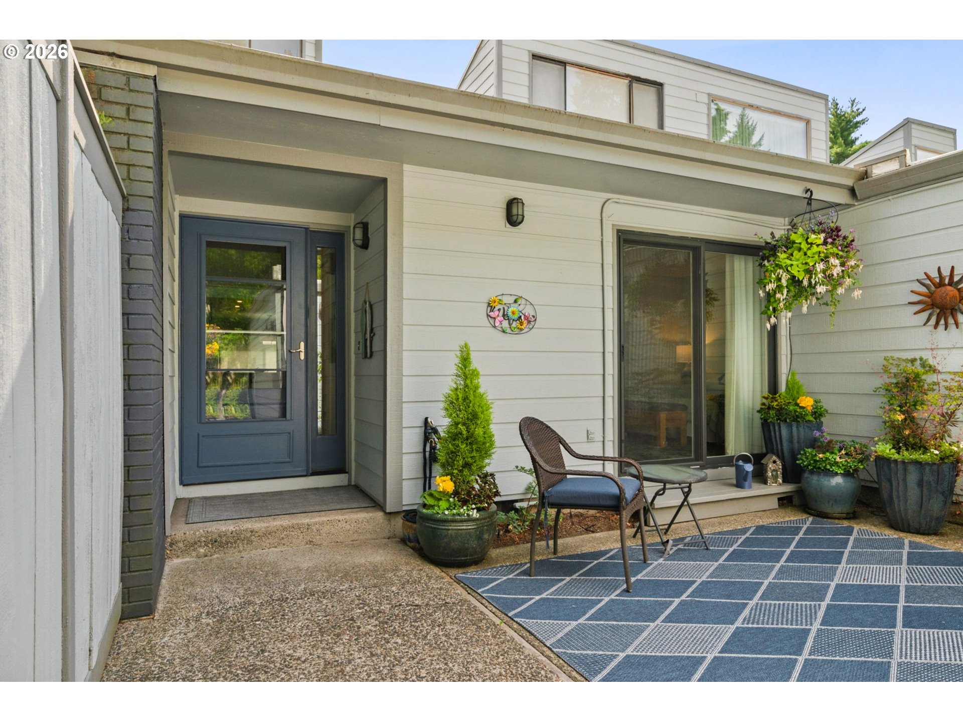 1200 Northeast Territorial Road, Unit 12 Canby, OR 97013 - Photo 36 of 38 a view of a house with a patio