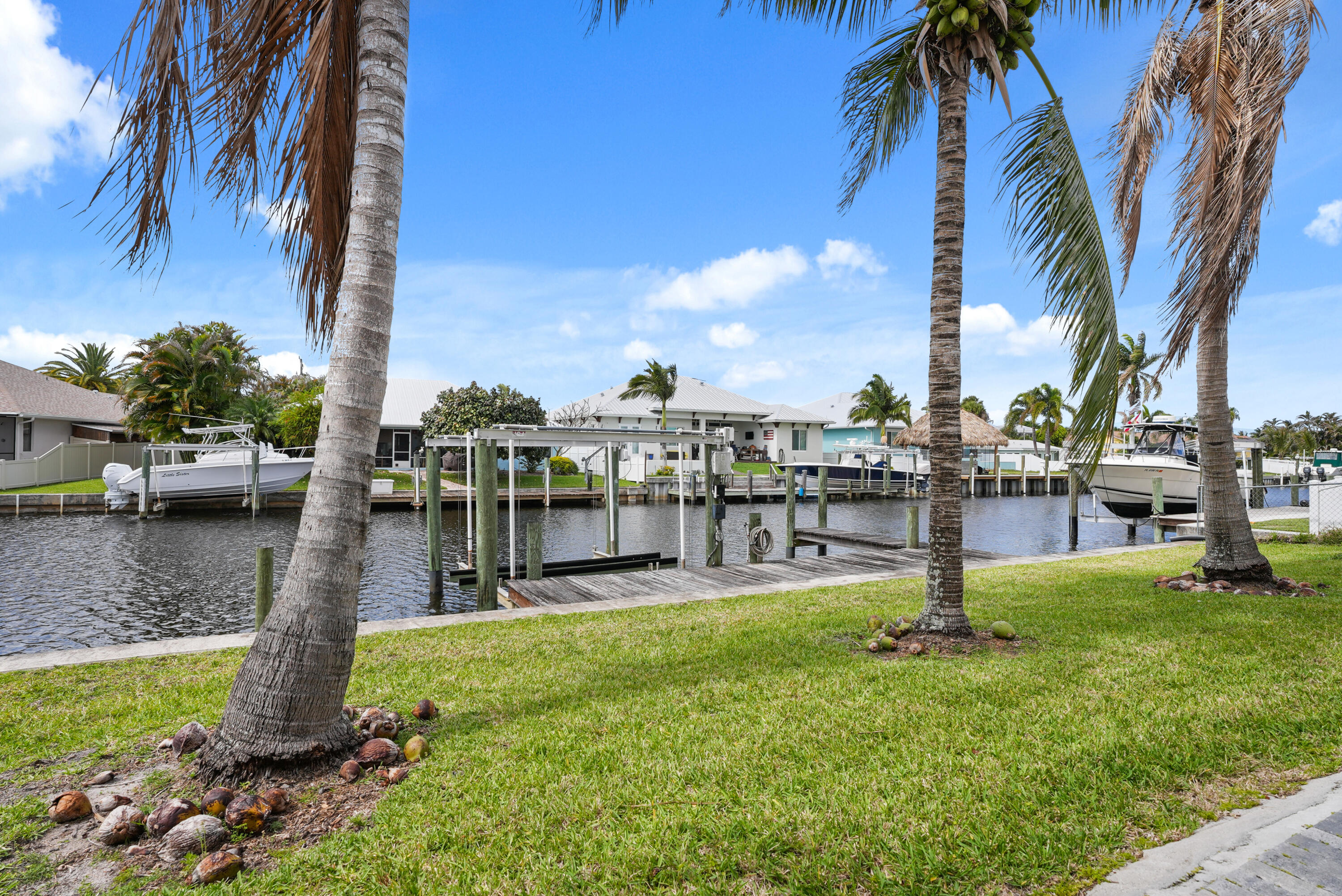 1459 Southwest Seahawk Way Palm City, FL 34990 - Photo 35 of 43 a park with lots of tall trees