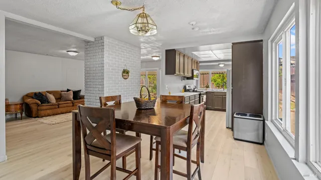 a view of a dining room with furniture