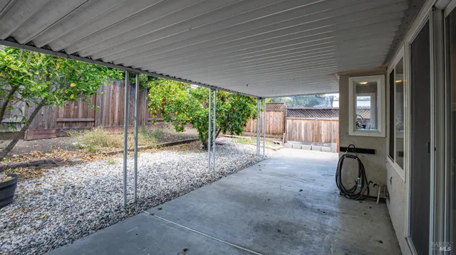 a view of backyard with green space