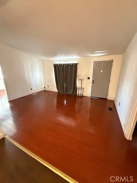 1855 East Riverside Drive, Unit 273 Ontario, CA 91761 - Photo 4 of 9 a view of an empty room with a window