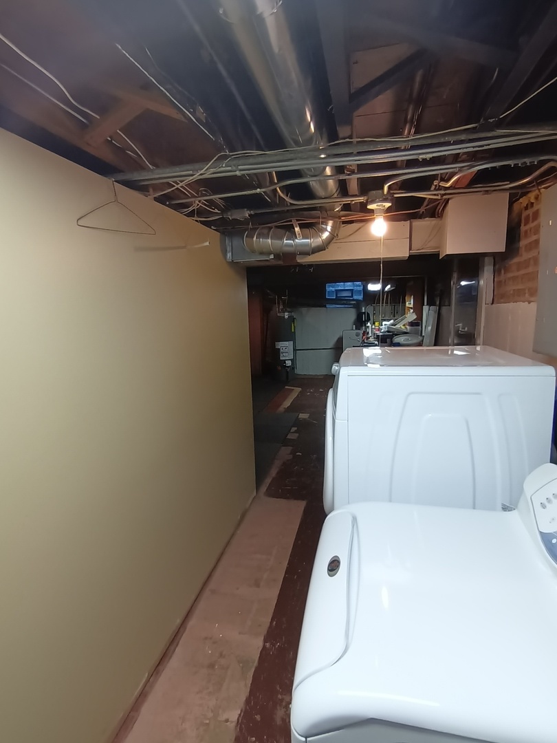 8742 East Prairie Road Skokie, IL 60076 - Photo 26 of 29 a utility room with dryer and washer