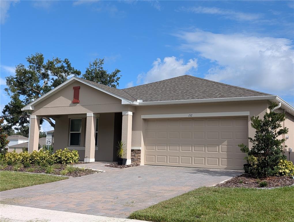 152 Jones Fish Camp Road Edgewater, FL 32141 - Photo 2 of 28 a view of a house with a yard and potted plants