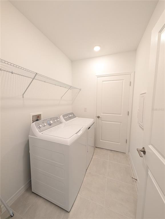 152 Jones Fish Camp Road Edgewater, FL 32141 - Photo 22 of 28 a utility room with dryer and washer