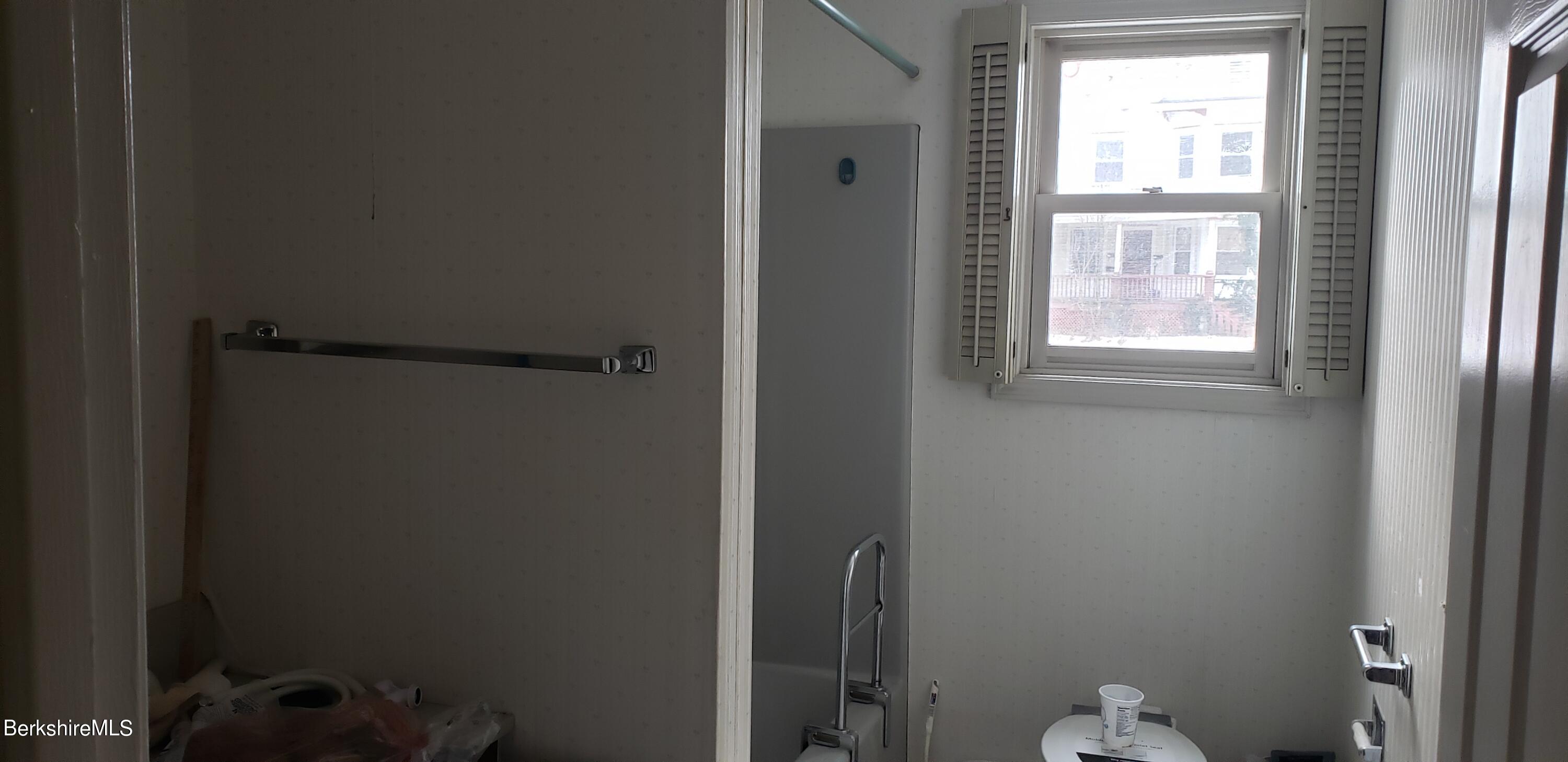 219-221 Church Street North Adams, MA 01247 - Photo 34 of 43 a bathroom with a window