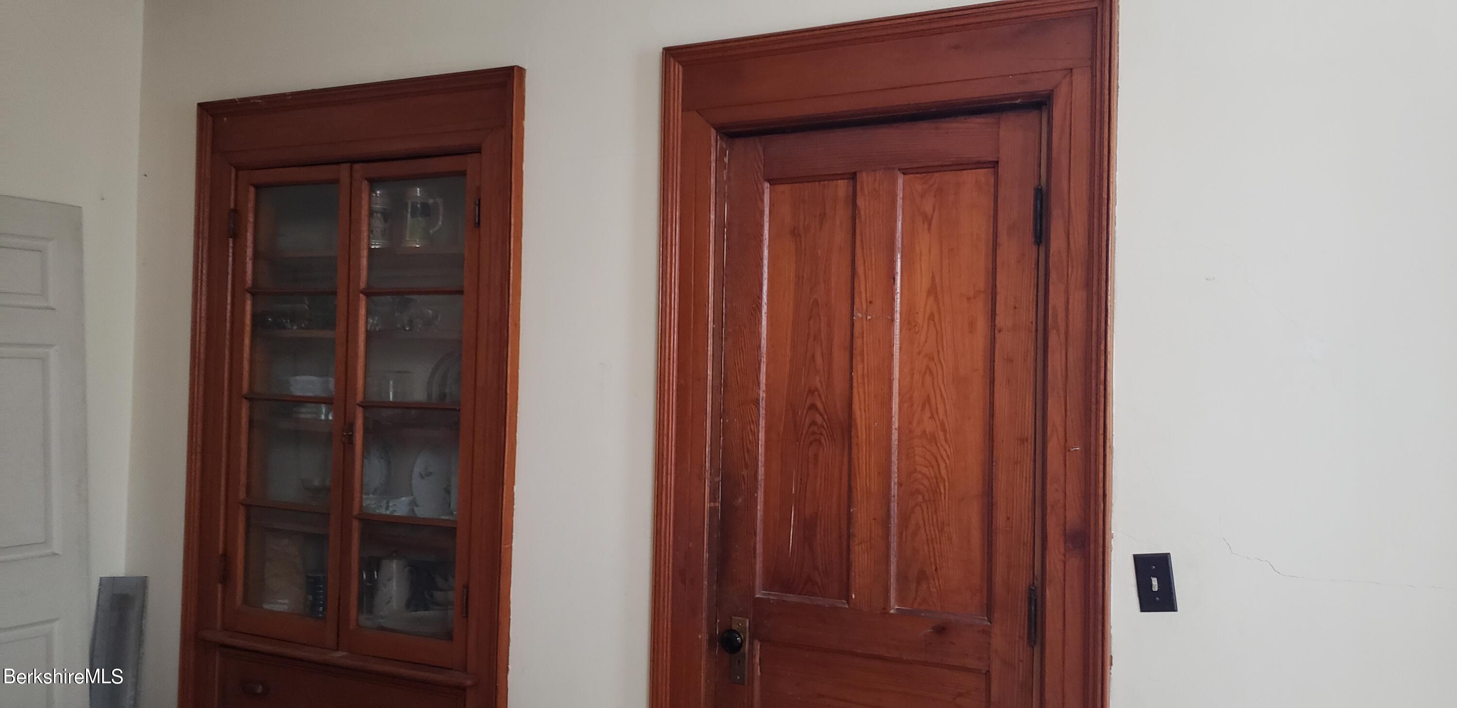 219-221 Church Street North Adams, MA 01247 - Photo 10 of 43 a view of a wooden door
