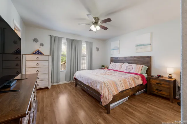 a bedroom with a bed and furniture