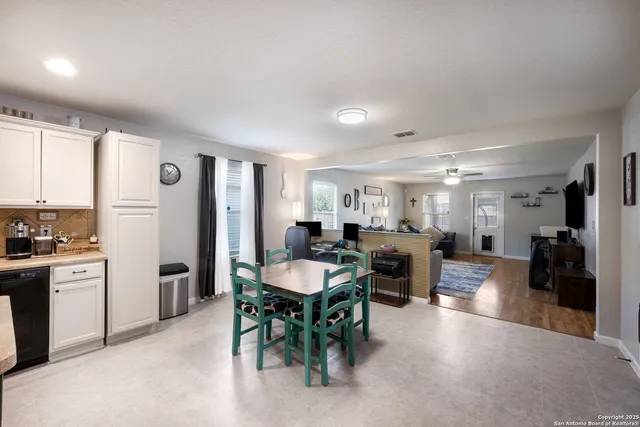 a view of a dining room with furniture