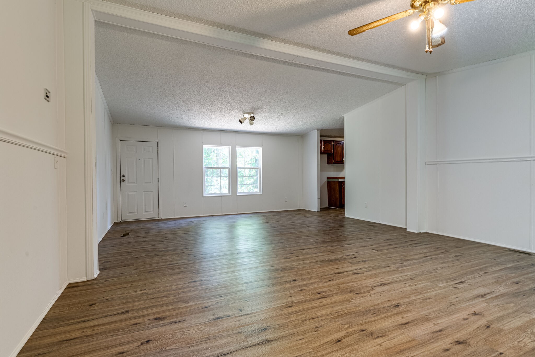 230 East Piney Road Dickson, TN 37055 - Photo 5 of 18 an empty room with wooden floor and windows